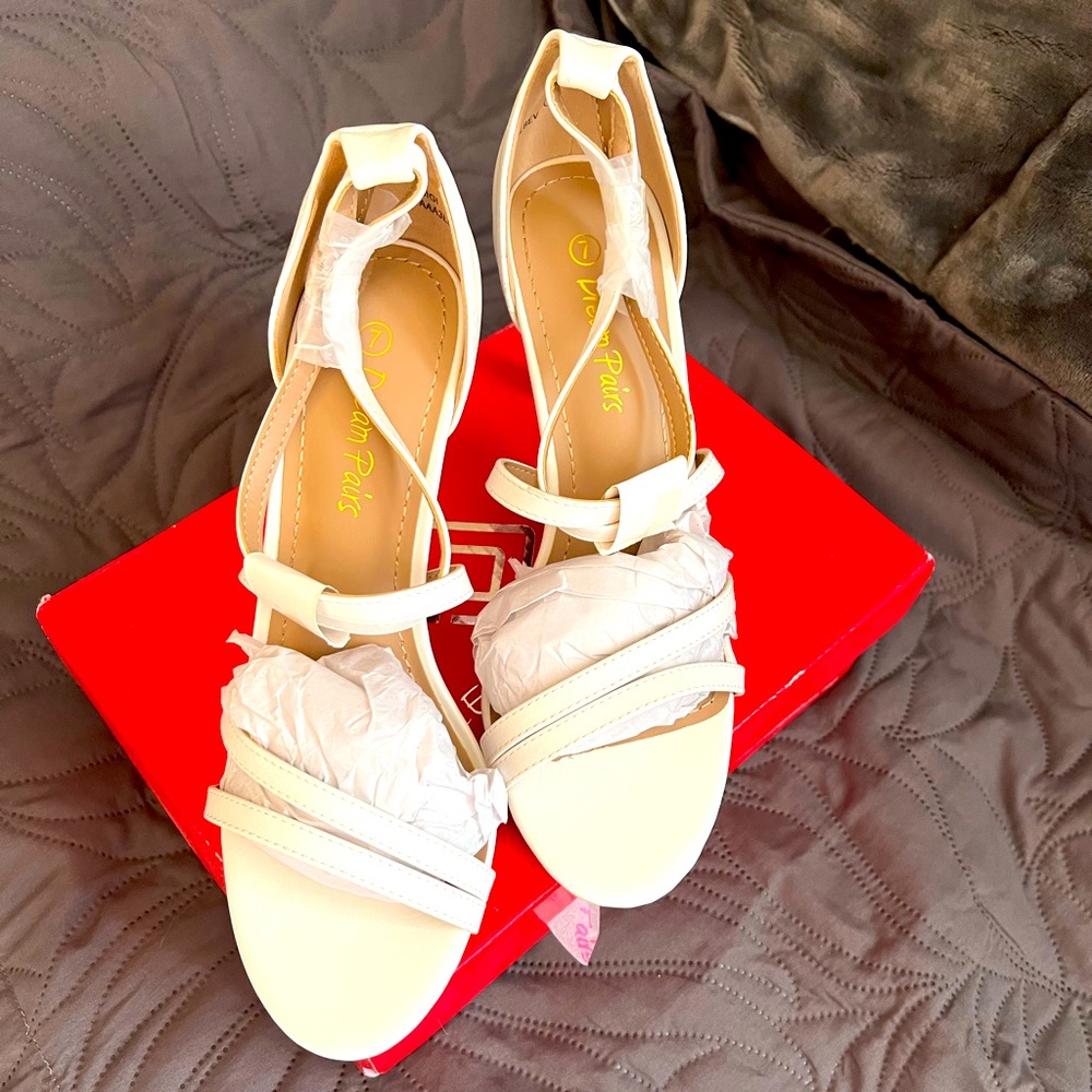 White dress shoes never worn.